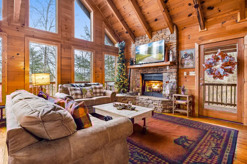 Living room with stone fireplace