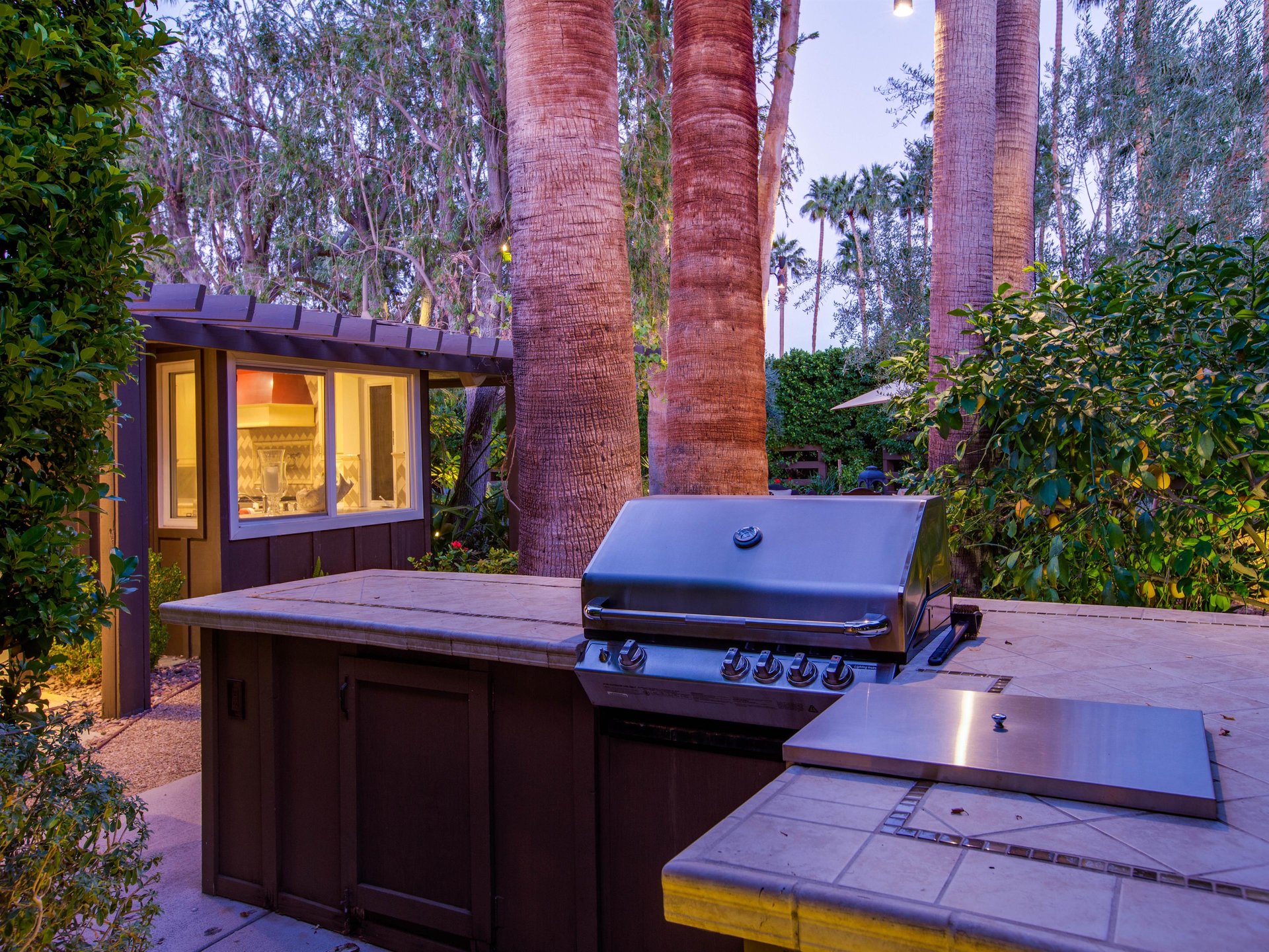 Prep a large group meal with friends on the grill