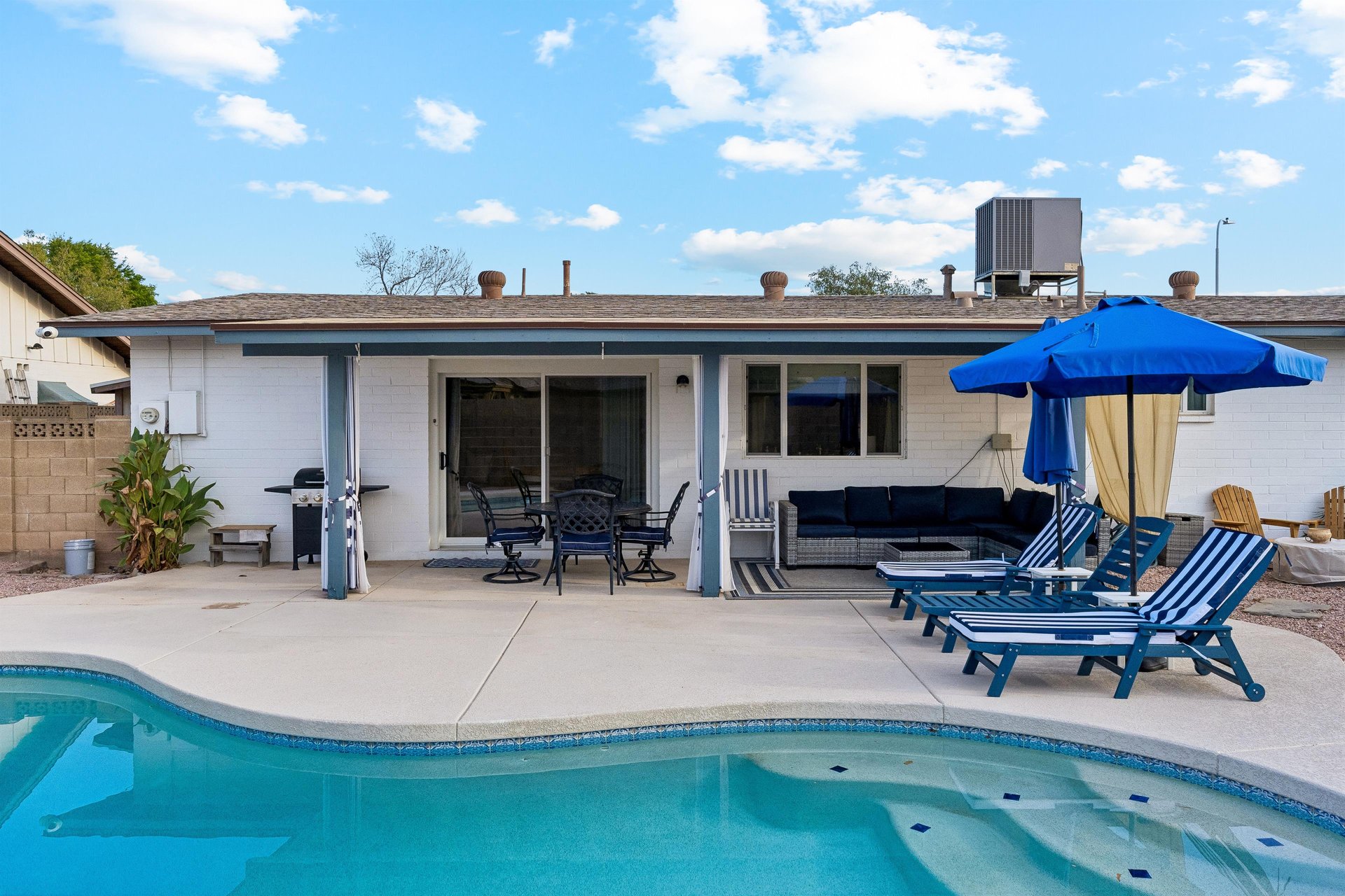 Private pool, BBQ, outdoor seating, and sun loungers.