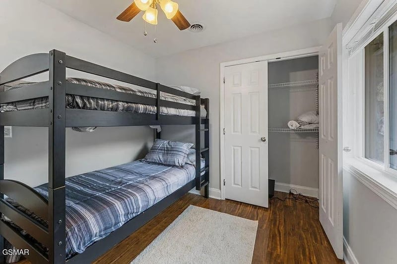 Your kids will love this cozy bunk room with comfortable striped bedding and plenty of closet space for all their vacation treasures.