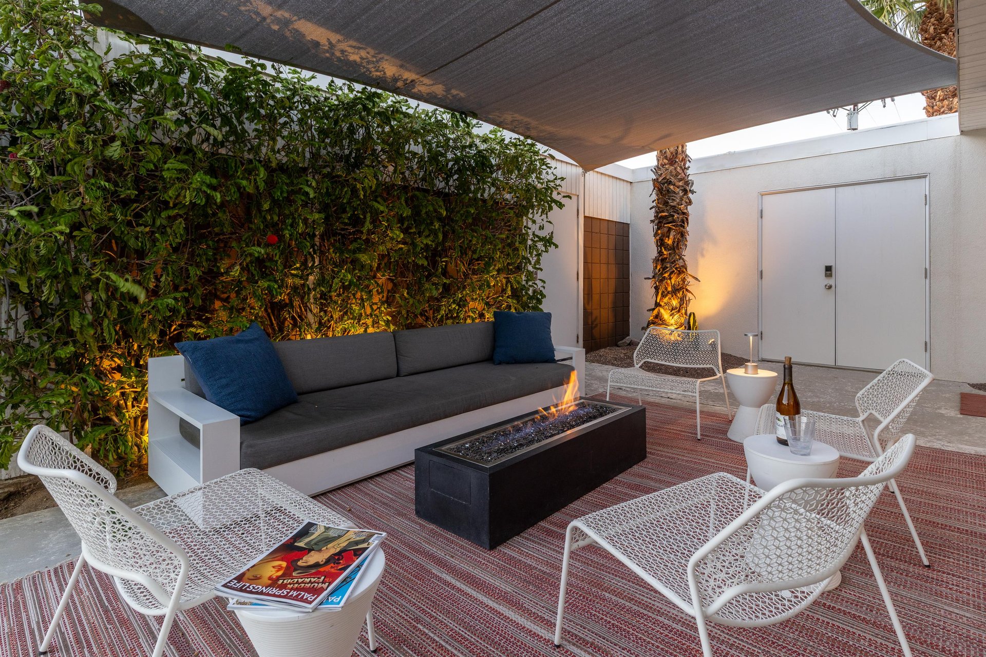 Gather around with the fire pit with a glass of wine