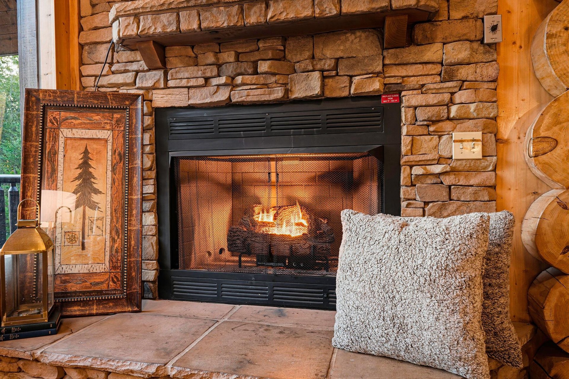 Gather by the warmth of your own stone fireplace, where crackling flames and cozy décor invite you to unwind after a day of adventure.