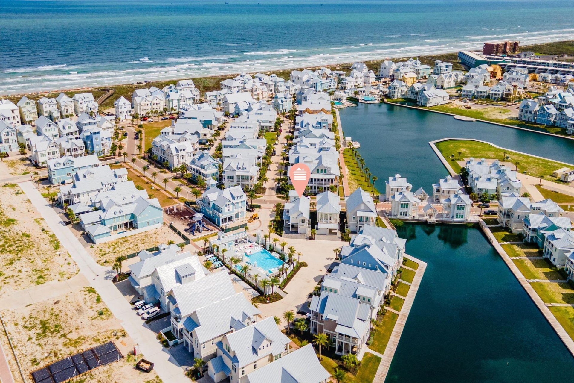 Steps from one of the many community pools, playground, lake, and a short stroll to the beach.