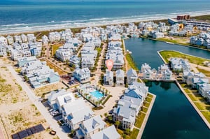 Steps from one of the many community pools, playground, lake, and a short stroll to the beach.