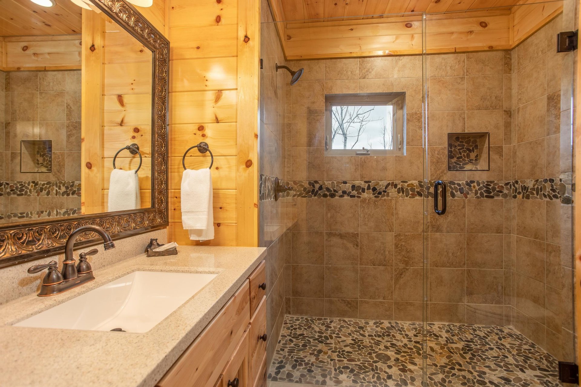Glassed shower at Happy Bears Hideaway, a 2 bedroom cabin rental located in Gatlinburg