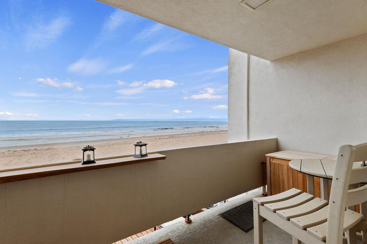 Bar top and two chairs. There is also a deck storage box to store your beach gear.