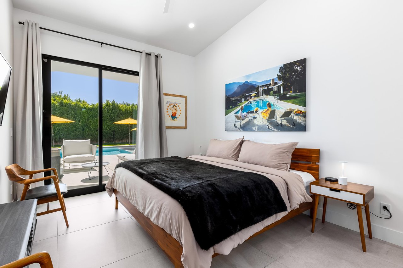 Easy patio access from this guest bedroom