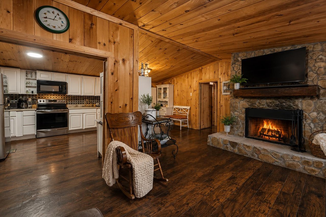 Living Room with Wood Burning Fireplace