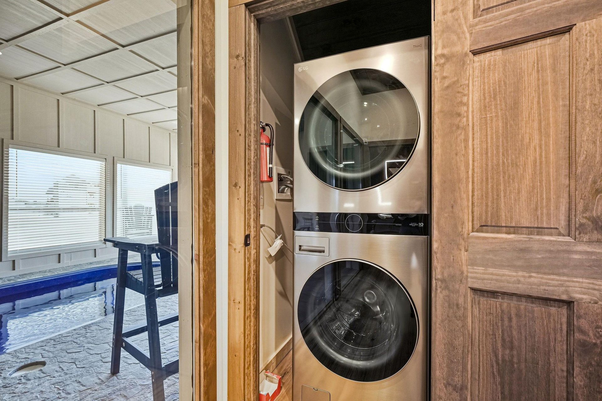 Your laundry worries disappear with this stacked washer and dryer tucked conveniently into your private closet space.