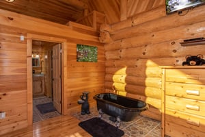 Soaking tub in the king bedroom on the main floor at Great View Lodge, a 5bedroom cabin rental located in Pigeon Forge