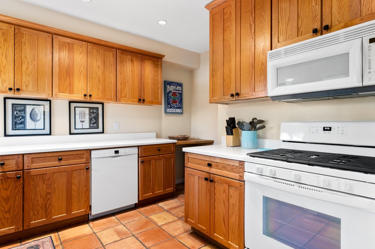 View of stove and additional counter space.