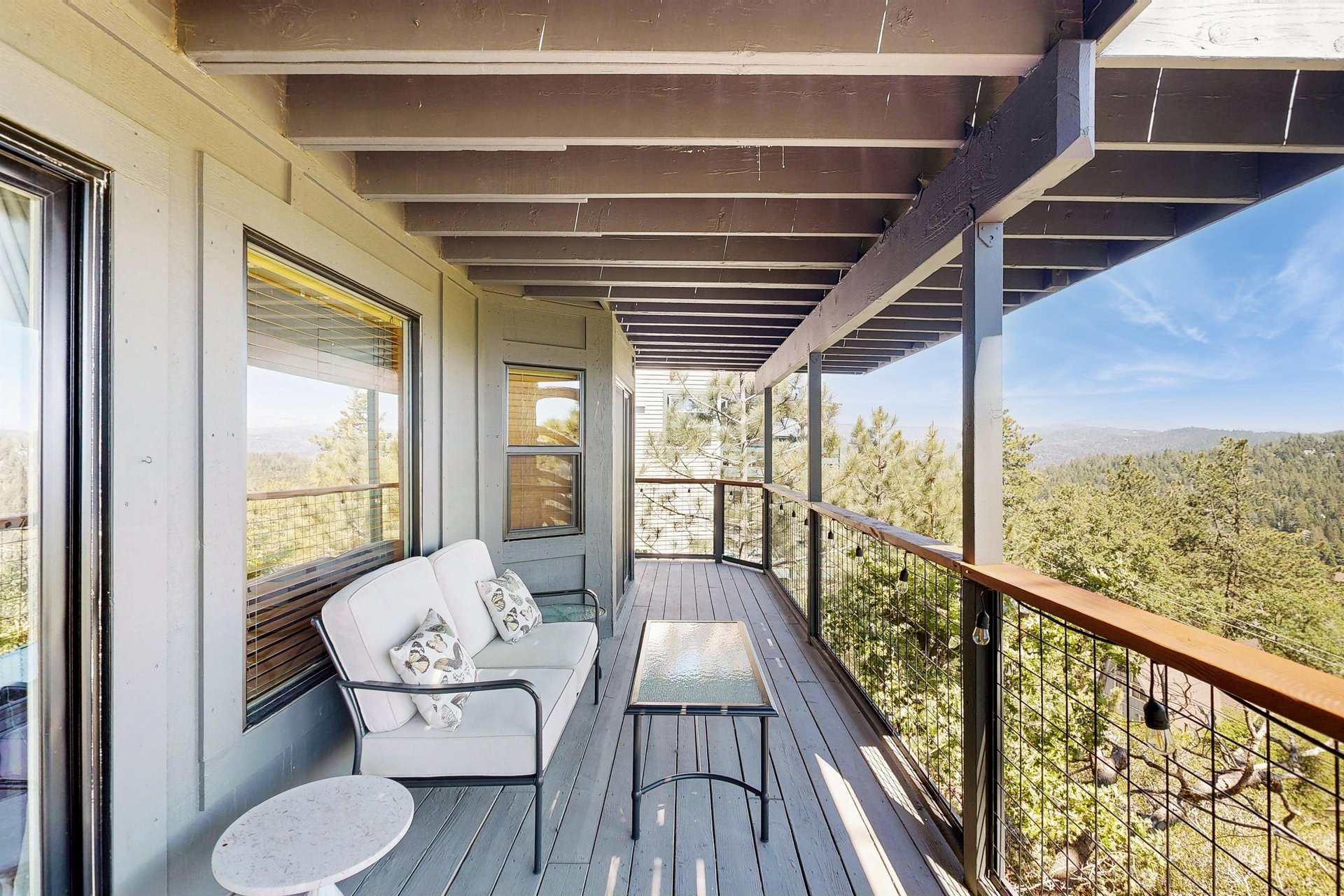 Deck access off of the primary and guest bedrooms.