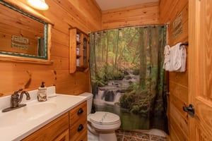 Bathroom with a tub and shower at Great View Lodge, a 5bedroom cabin rental located in Pigeon Forge