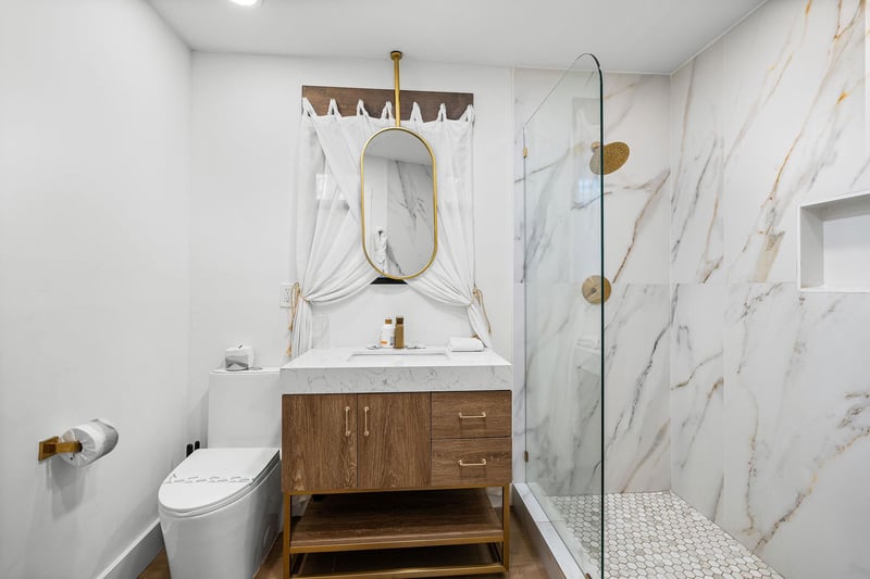 full bathroom with tile shower