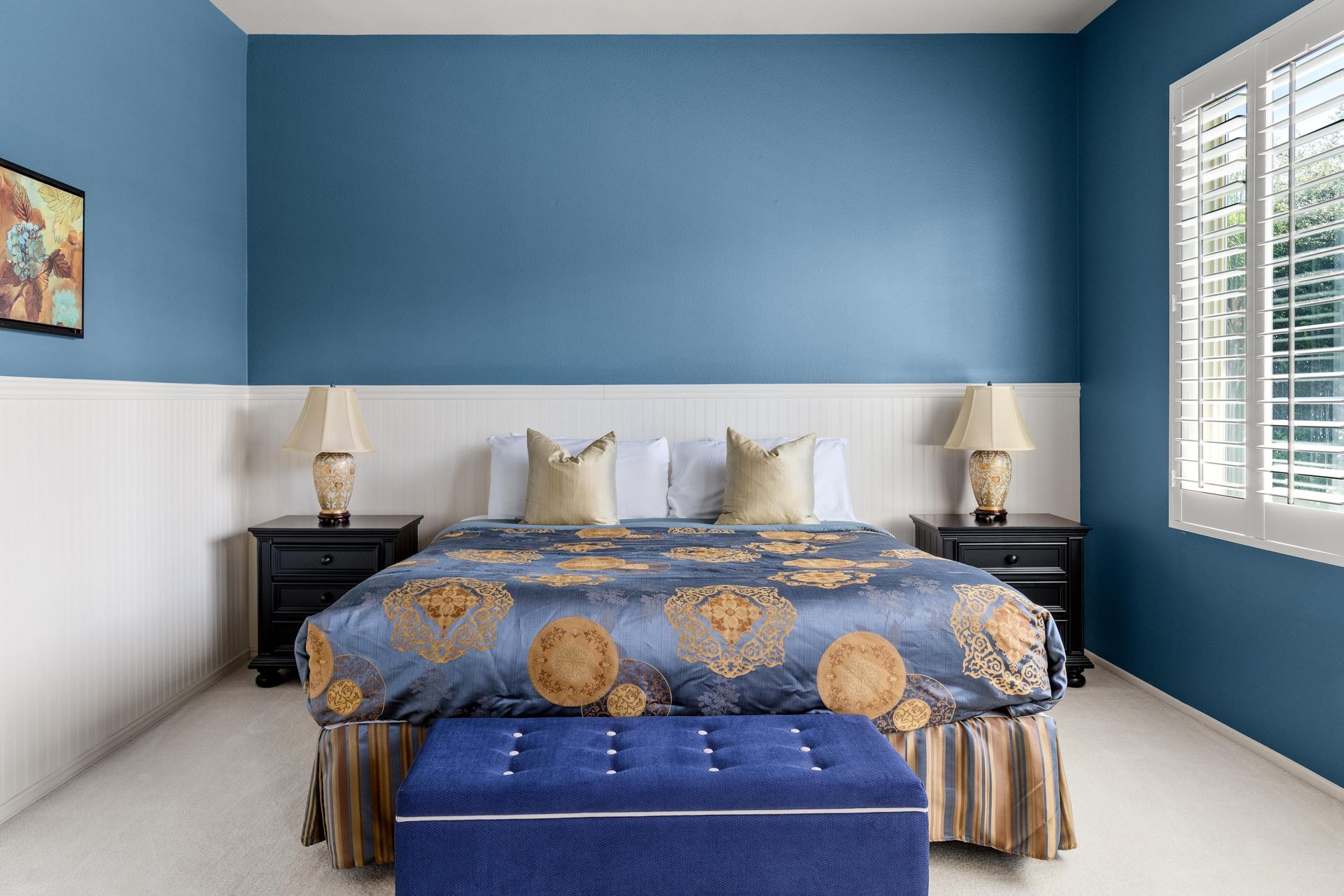 King size bed, exercise equipment, flatscreen TV, patio access, and ensuite bathroom.