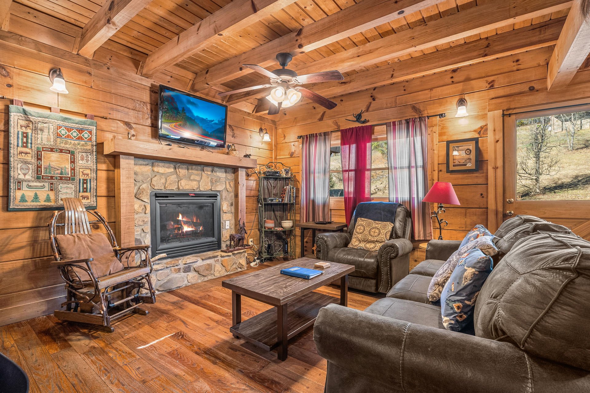 Living room seating with stone fireplace