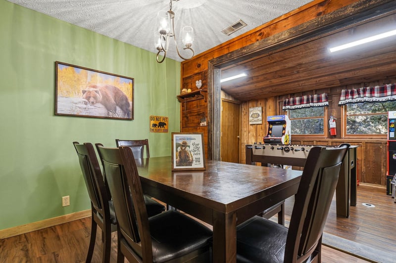 Gather around your rustic dining table for memorable meals, then challenge friends to games in the adjacent game room.
