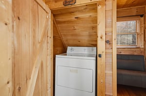 Your laundry closet makes it easy to keep fresh during your stay in this cozy cabin retreat.