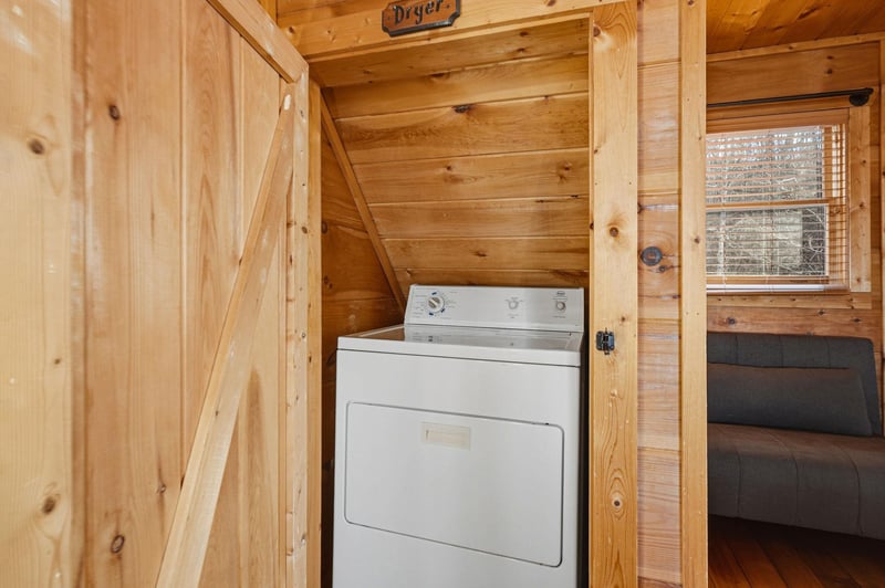 Your laundry closet makes it easy to keep fresh during your stay in this cozy cabin retreat.
