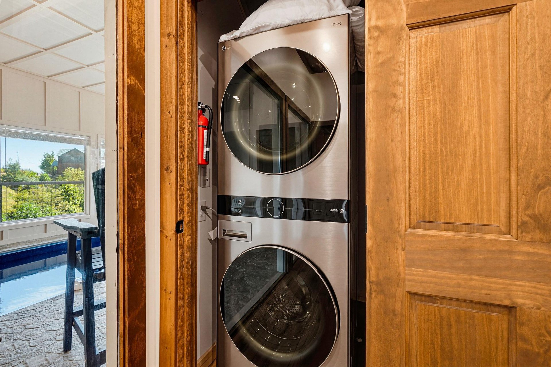 Your laundry is effortlessly handled with inunit stacked washer and dryer, tucked neatly into a closet for convenience without sacrificing space or style.