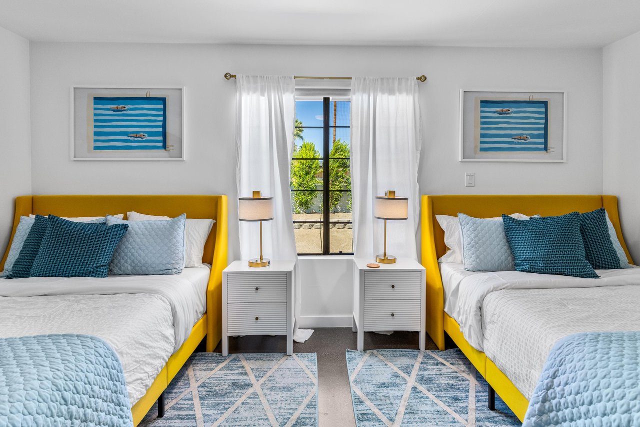 Guest bedroom with two queen beds