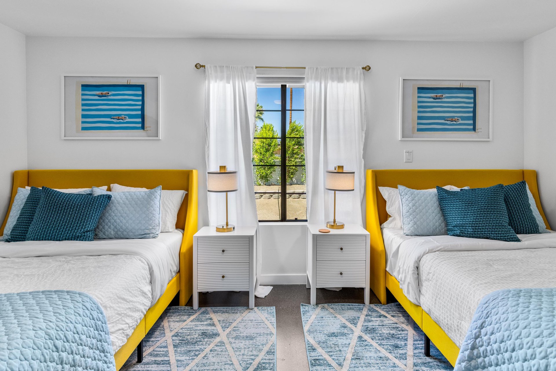 Guest bedroom with two queen beds