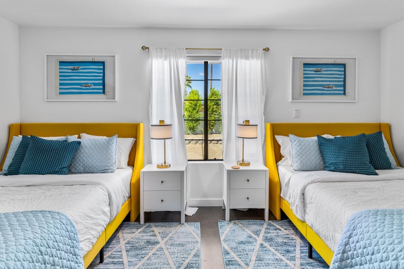 Guest bedroom with two queen beds