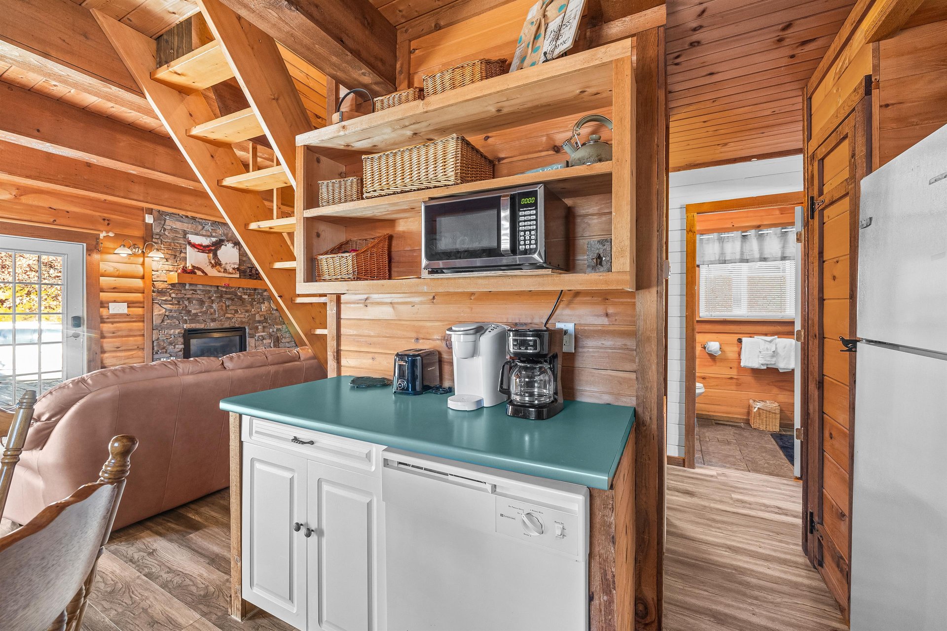Kitchen cabinets and small appliances at Living on Love, a 2 bedroom cabin rental located in Pigeon Forge