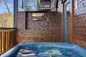 Slip into your private hot tub on the deck, surrounded by wooded serenity, and let the warm bubbles melt away your cares as you breathe in the fresh mountain air.