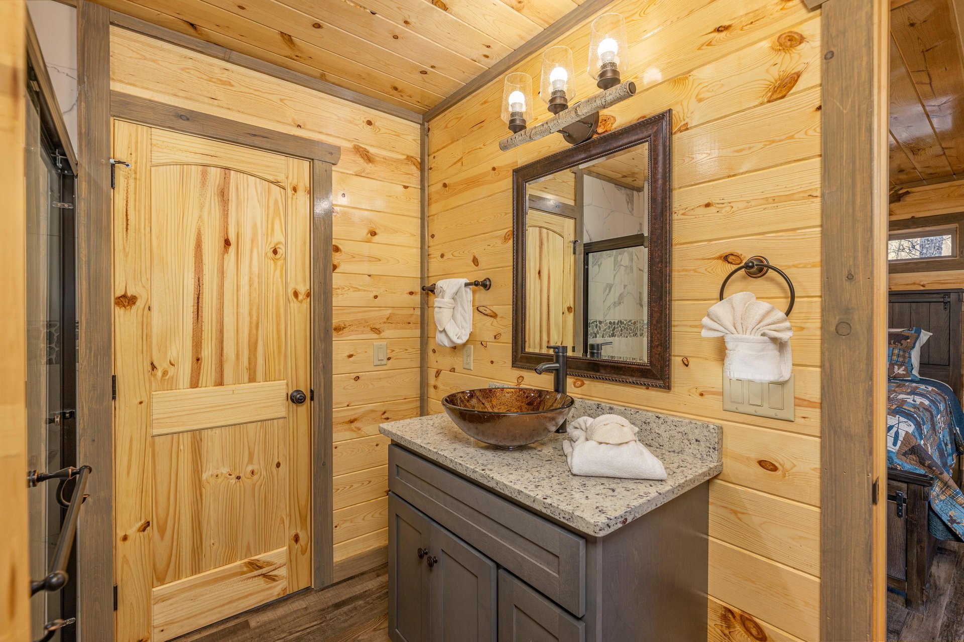 Vanity with a custom sink at Everlys Splash, a 4 bedroom cabin rental located in Pigeon Forge