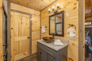 Vanity with a custom sink at Everlys Splash, a 4 bedroom cabin rental located in Pigeon Forge