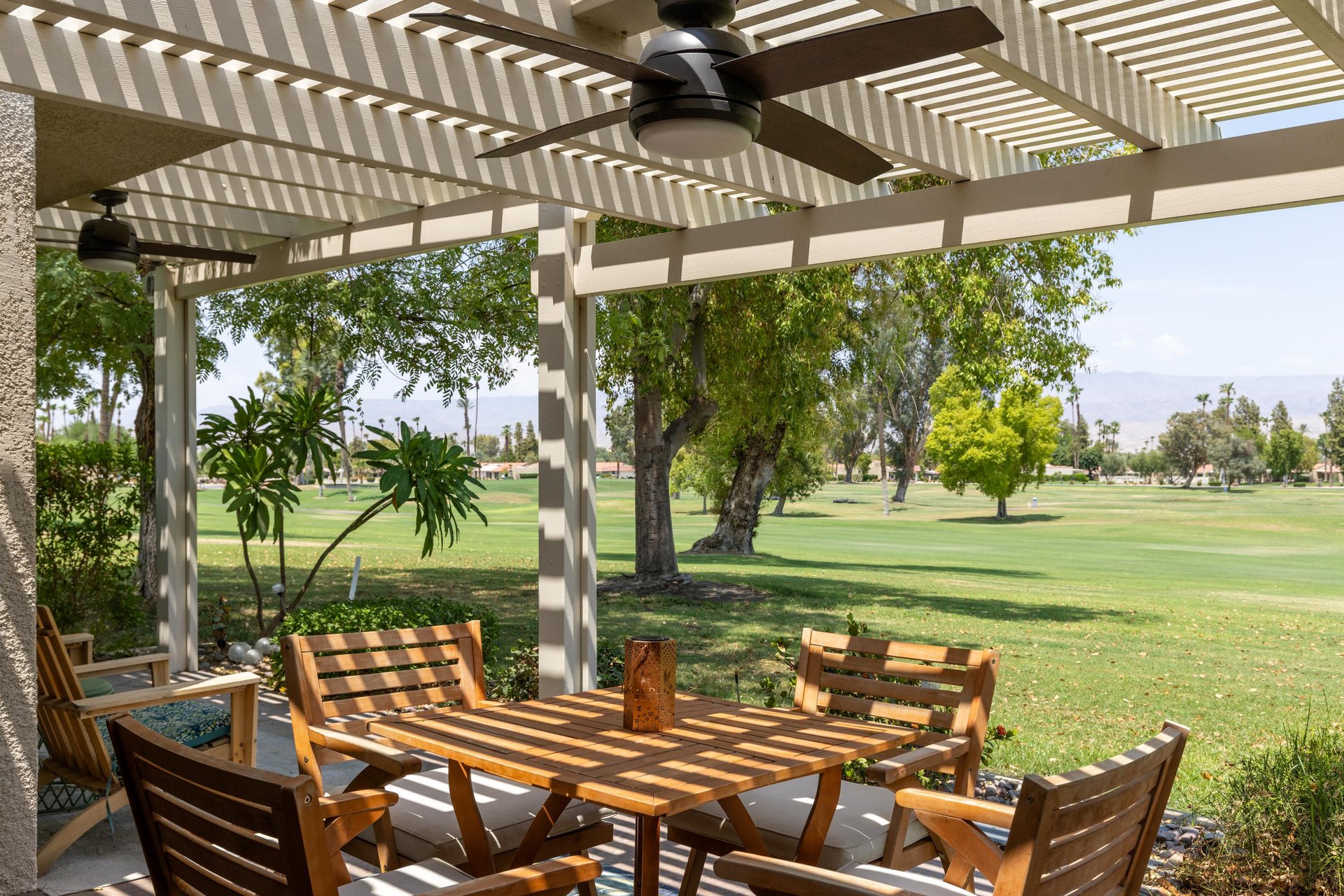 Home is located on the golf course, which can be seen off the back patio.