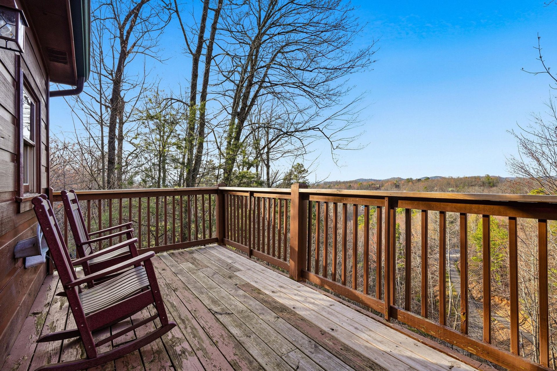 Settle into your rocking chairs on this peaceful deck, where mountain vistas and rolling hills create the perfect backdrop for morning coffee or evening relaxation.
