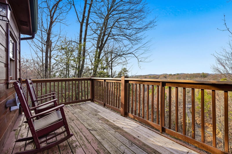 Settle into your rocking chairs on this peaceful deck, where mountain vistas and rolling hills create the perfect backdrop for morning coffee or evening relaxation.