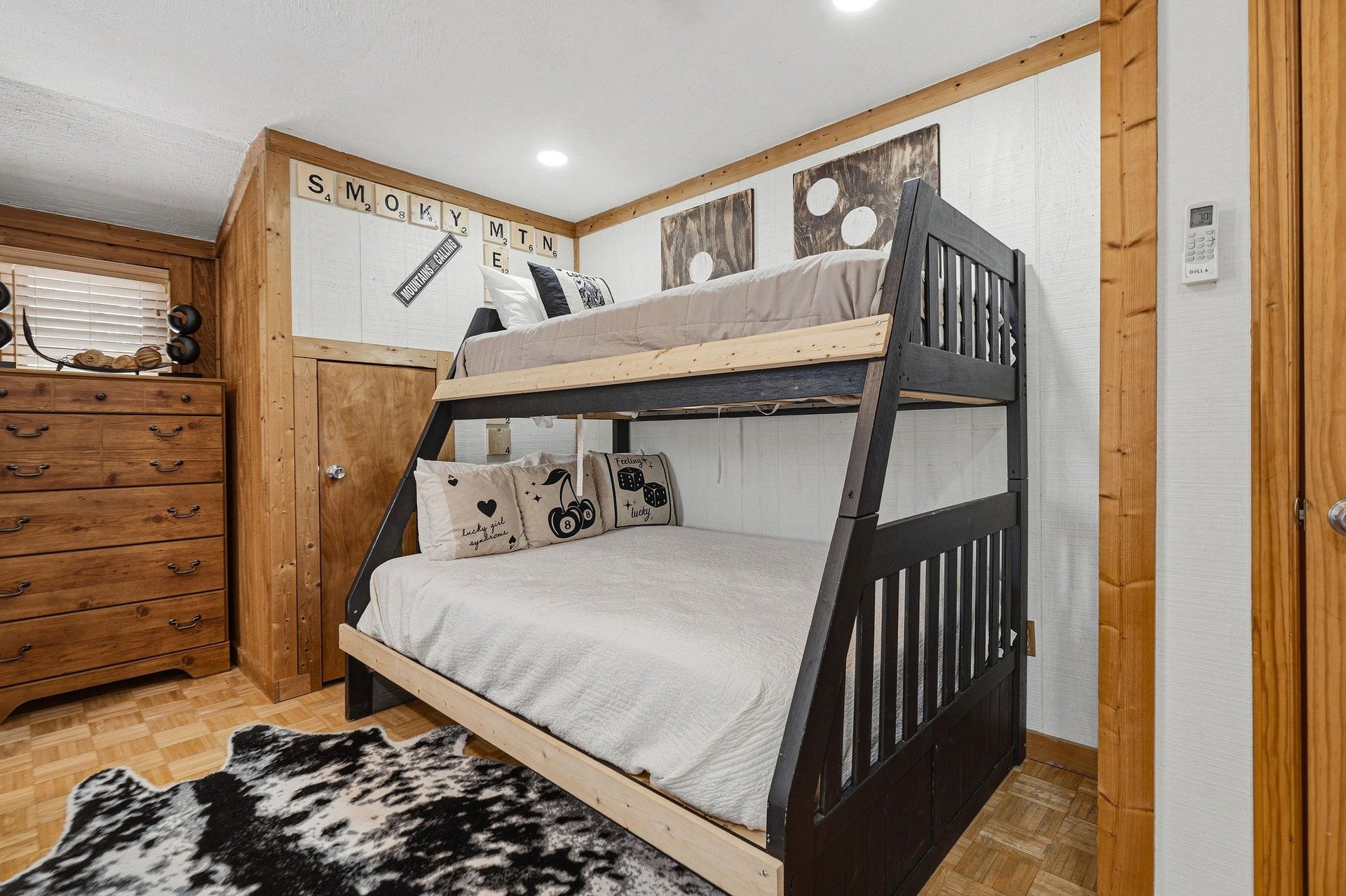 Your cozy bunk room with rustic charm and playful Smoky Mountain touches creates the perfect sleep sanctuary.