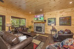 Living room with stone fireplace
