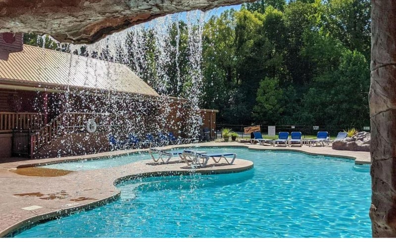 Dive into your private oasis with crystalclear waters and splash fountains creating a refreshing retreat under natural shade.