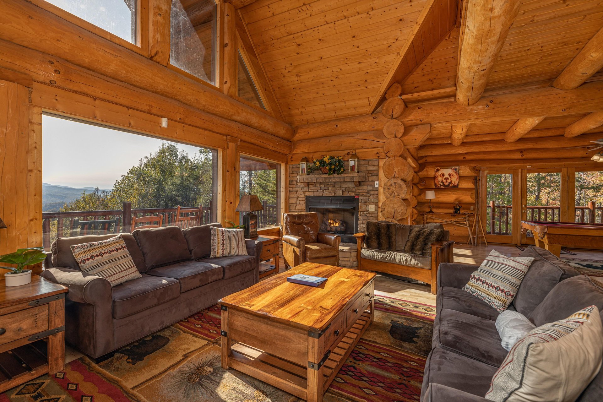 Living room with stone fireplace