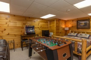 Foosball in the lower bedroom at Kellys Cabin, a 1 bedroom cabin rental located in Pigeon Forge