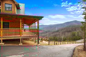 Deck at Four Seasons Grand, a 5 bedroom cabin rental located in Pigeon Forge