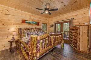 King size log bed with balcony