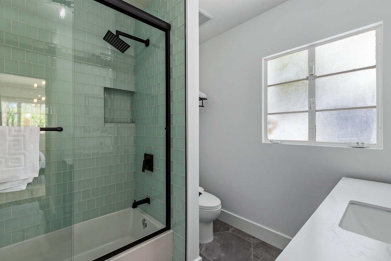 Guest shower with waterfall feature
