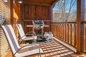 Fire up your favorite meals on your private deck, where comfortable seating and forest views create the perfect outdoor dining experience.