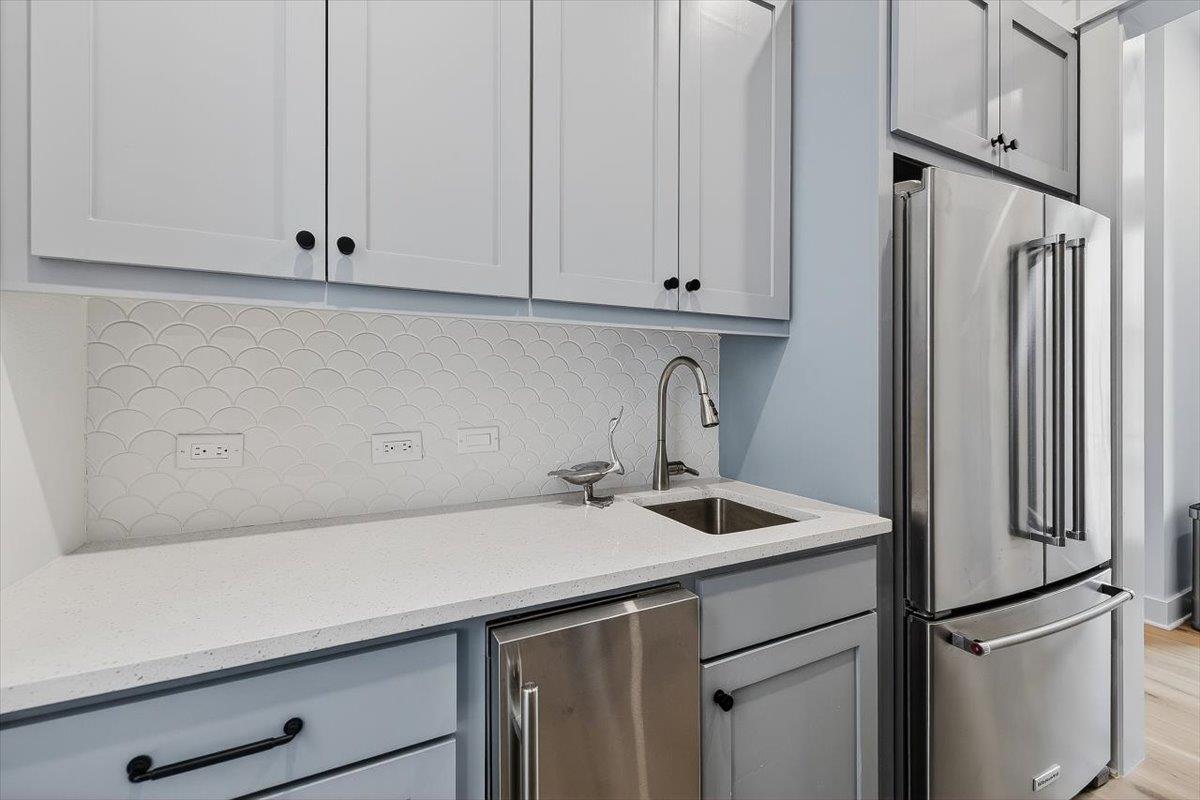 Featuring an additional fridge and ice maker.