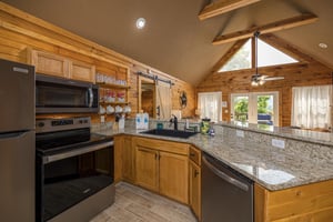 Kitchen with granite countertopsbar