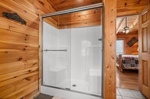 Shower in a bathroom at Mountain Mama, a 3 bedroom cabin rental located in Pigeon Forge