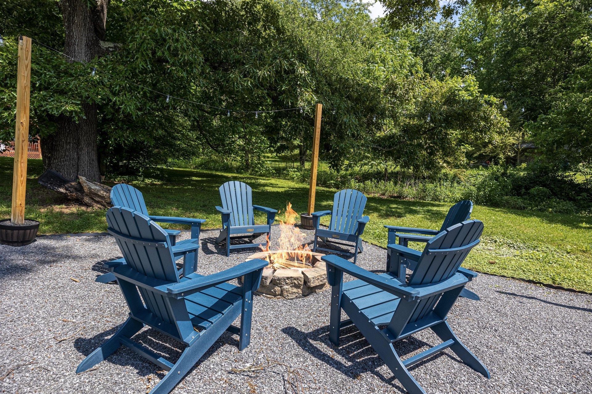 fire pit with Adirondack chairs
