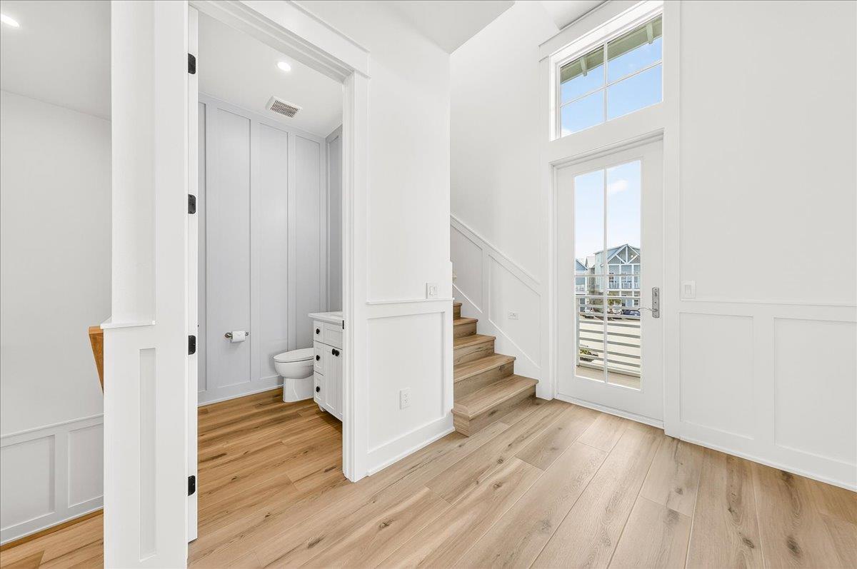 Powder room and stairs to 3rd floor.