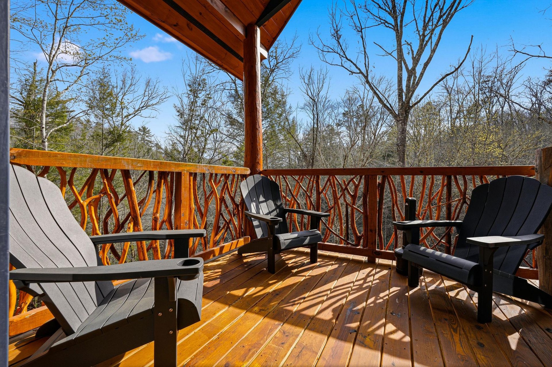 Settle into these comfortable deck chairs and soak up the peaceful forest views from your private balcony retreat.