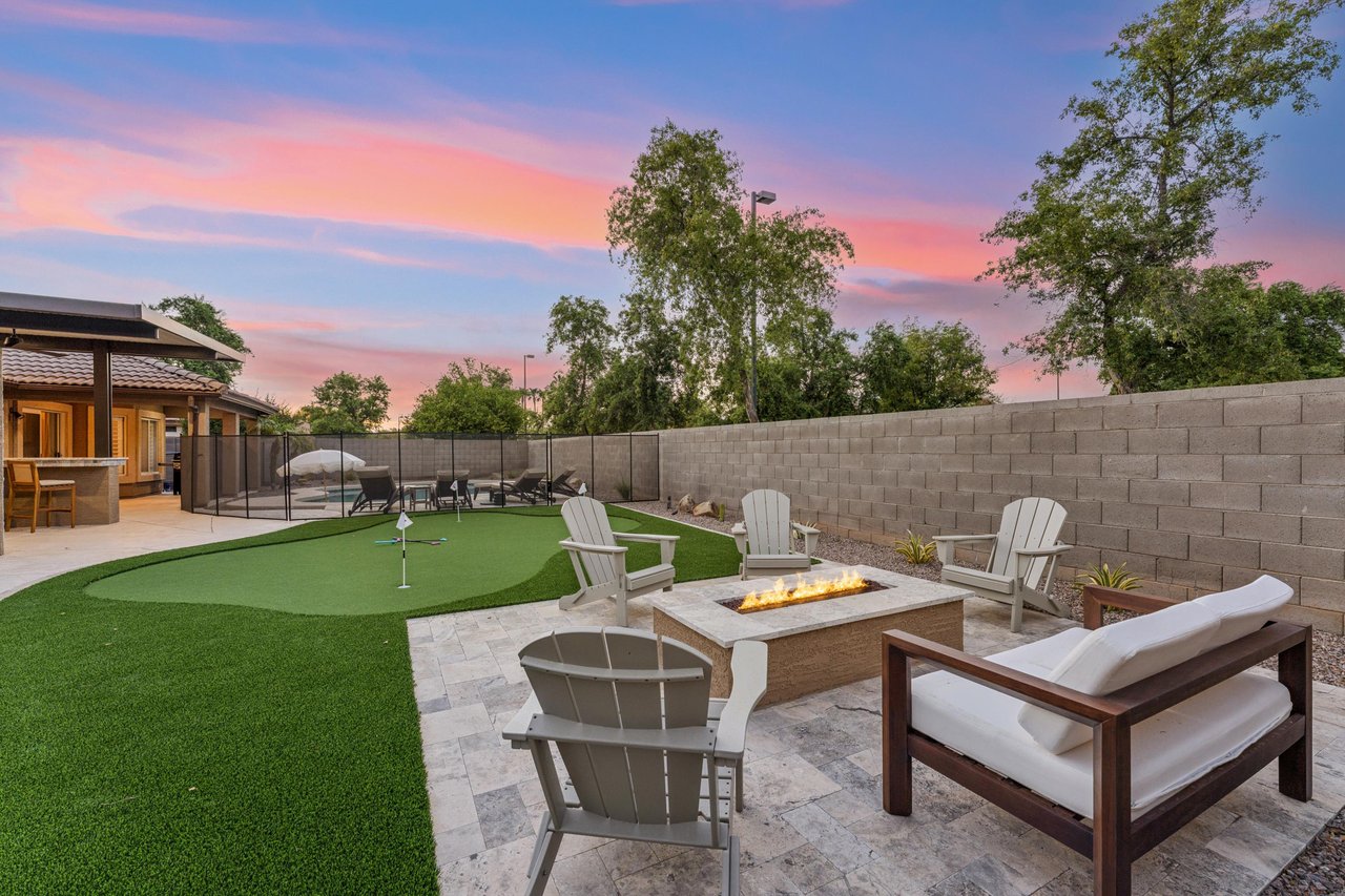 Putting green and firepit.